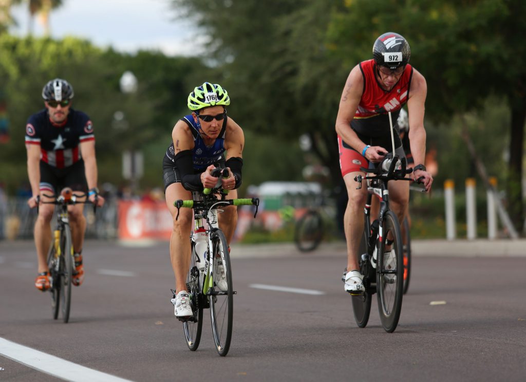 Athletes participate in the 2015 Ironman Arizona at Tempe Beach Park on November 15. Participants ranged from ages 18 – 85 and swam 2.4 miles, biked 112 miles and ran 26.2 miles. For more photos visit www.wranglernews.com. Wrangler News photo by Ana Ramirez.