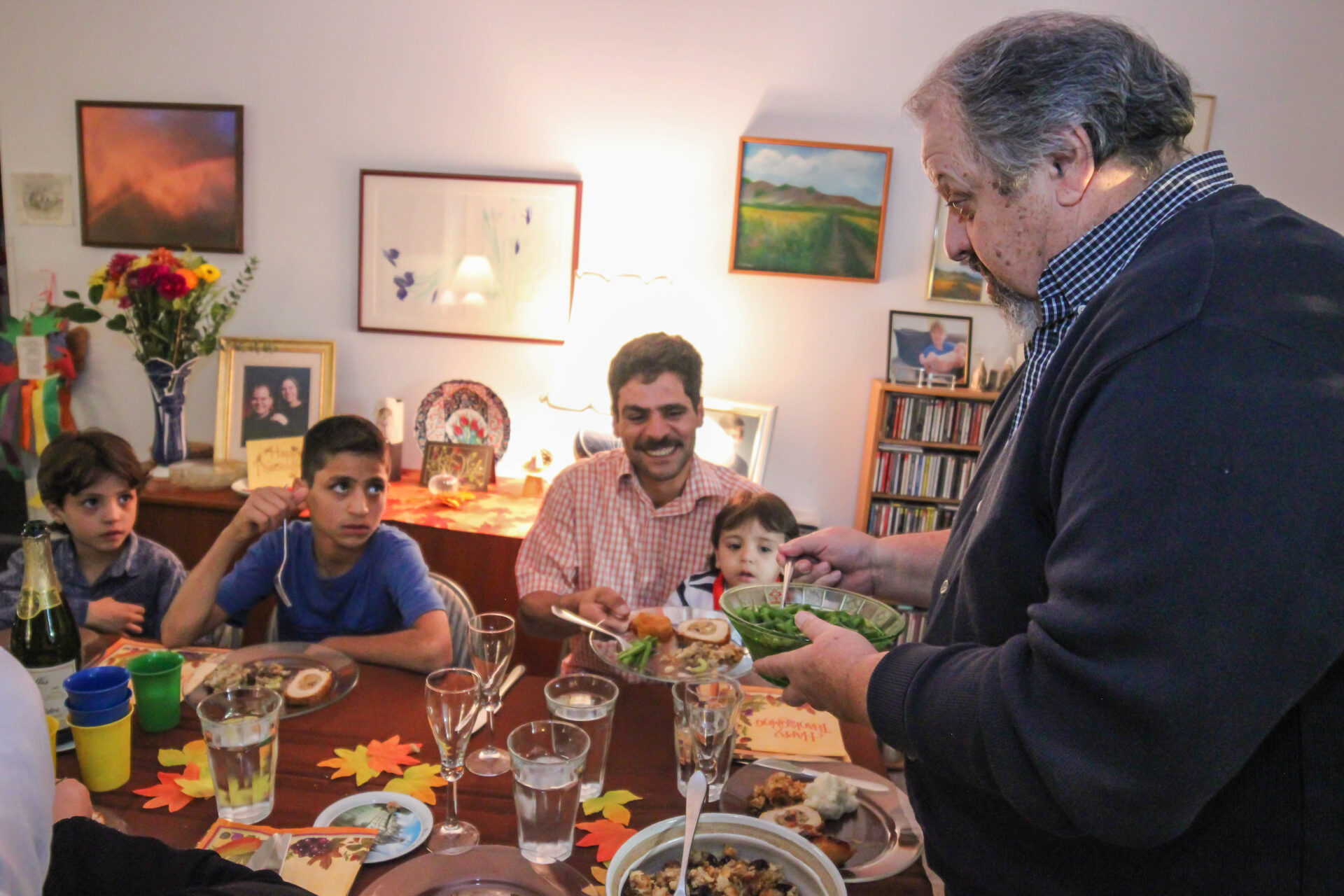 The Kaders of Tempe welcomed a Syrian refugee family to their home to share a holiday feast. (Wrangler News photo by Alex J. Walker)